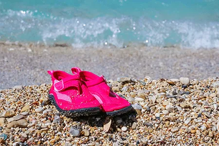 Kids wearing water shoes outdoors